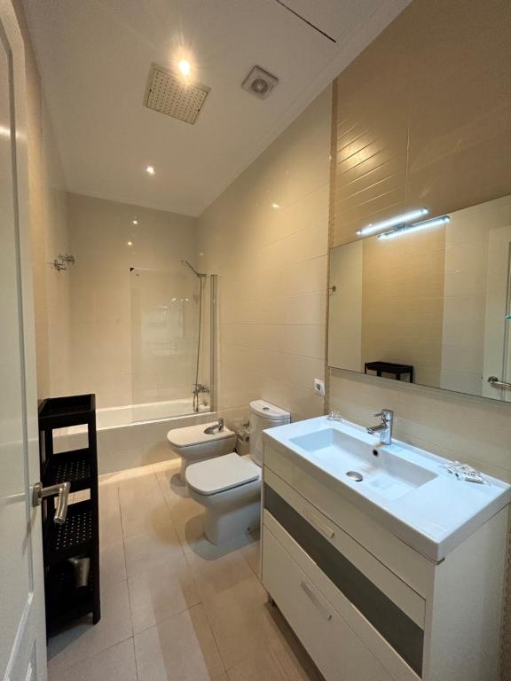 Koupelna v ubytování Olavide Premium Apartments
