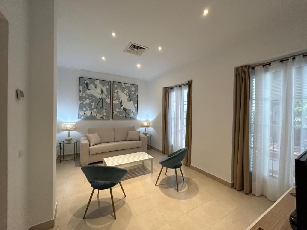 Posezení v ubytování Olavide Premium Apartments