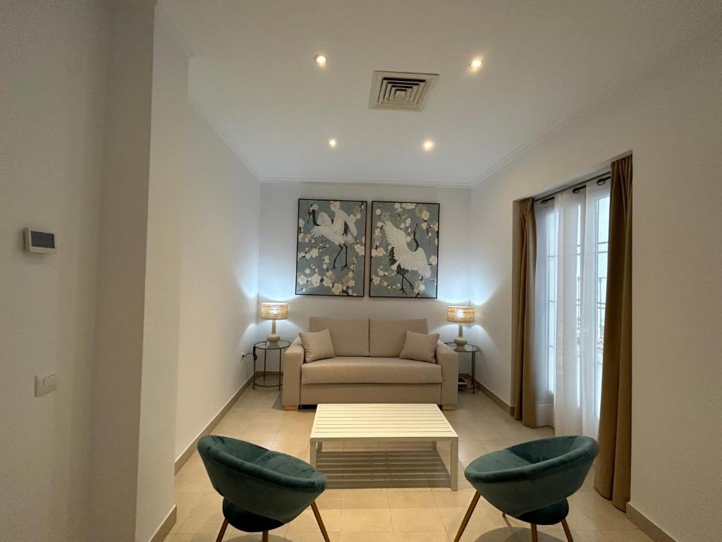 Posezení v ubytování Olavide Premium Apartments
