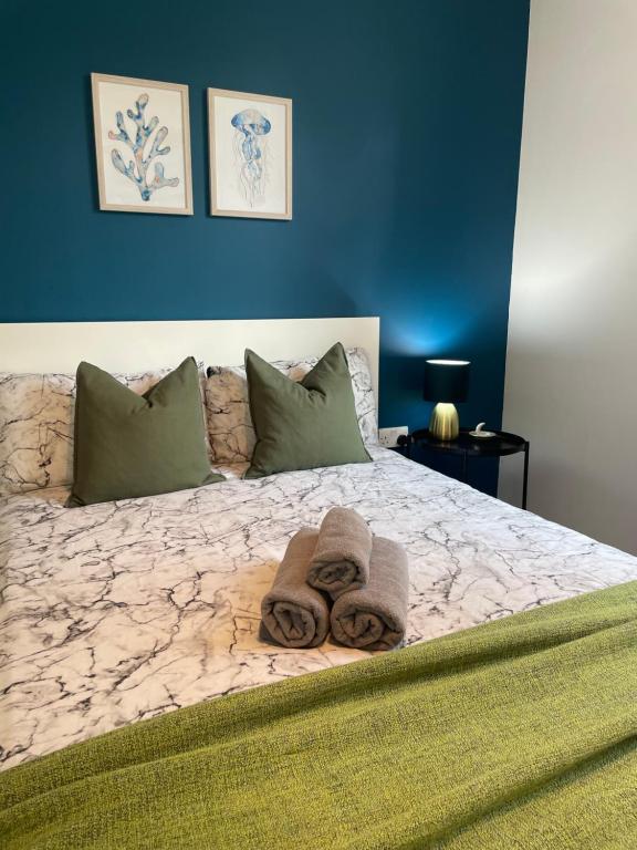 Кровать или кровати в номере Willesden Green ROOMS