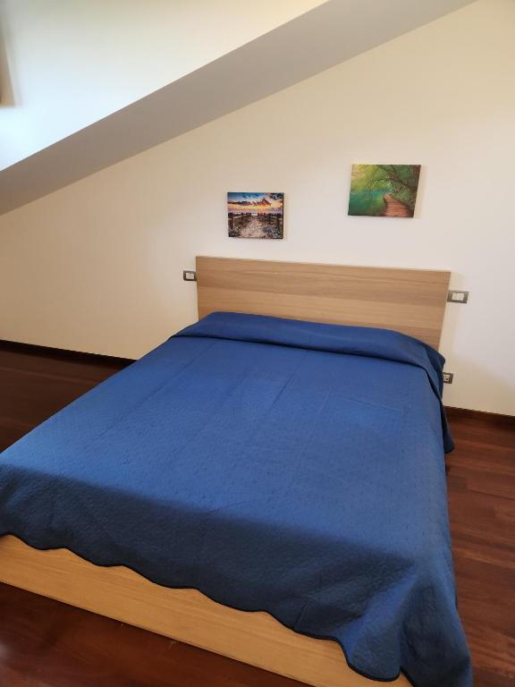 Postel nebo postele na pokoji v ubytování Marco Simone Golf - Roma