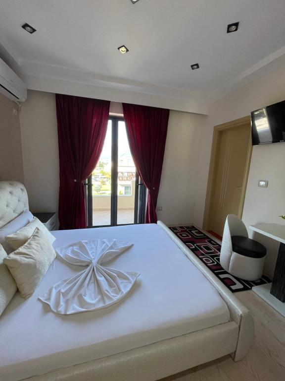 Postel nebo postele na pokoji v ubytování Hotel Selfo