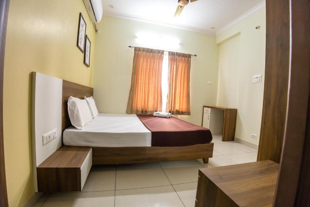 Postel nebo postele na pokoji v ubytování KK SERVICE APARTMENTS