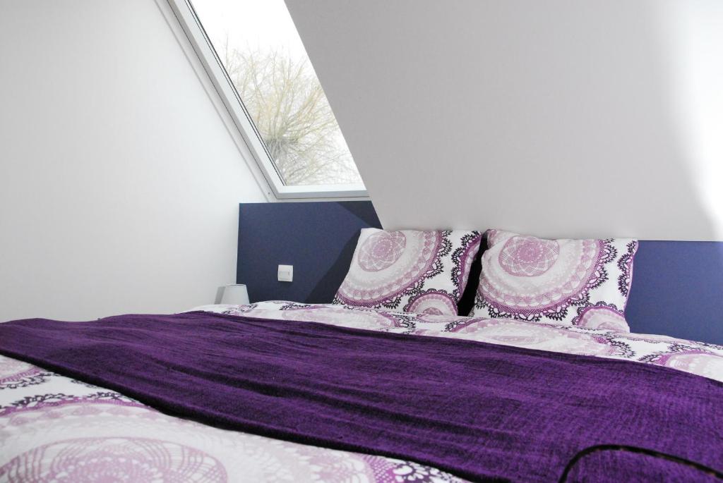 Postel nebo postele na pokoji v ubytování B&B Het Schaliënhof