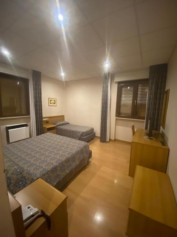 Postel nebo postele na pokoji v ubytování Park Hotel