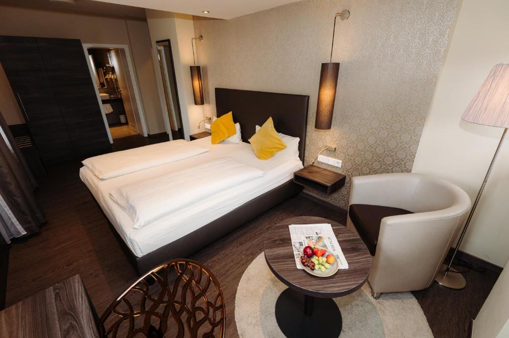 Postel nebo postele na pokoji v ubytování Hotel Säntis
