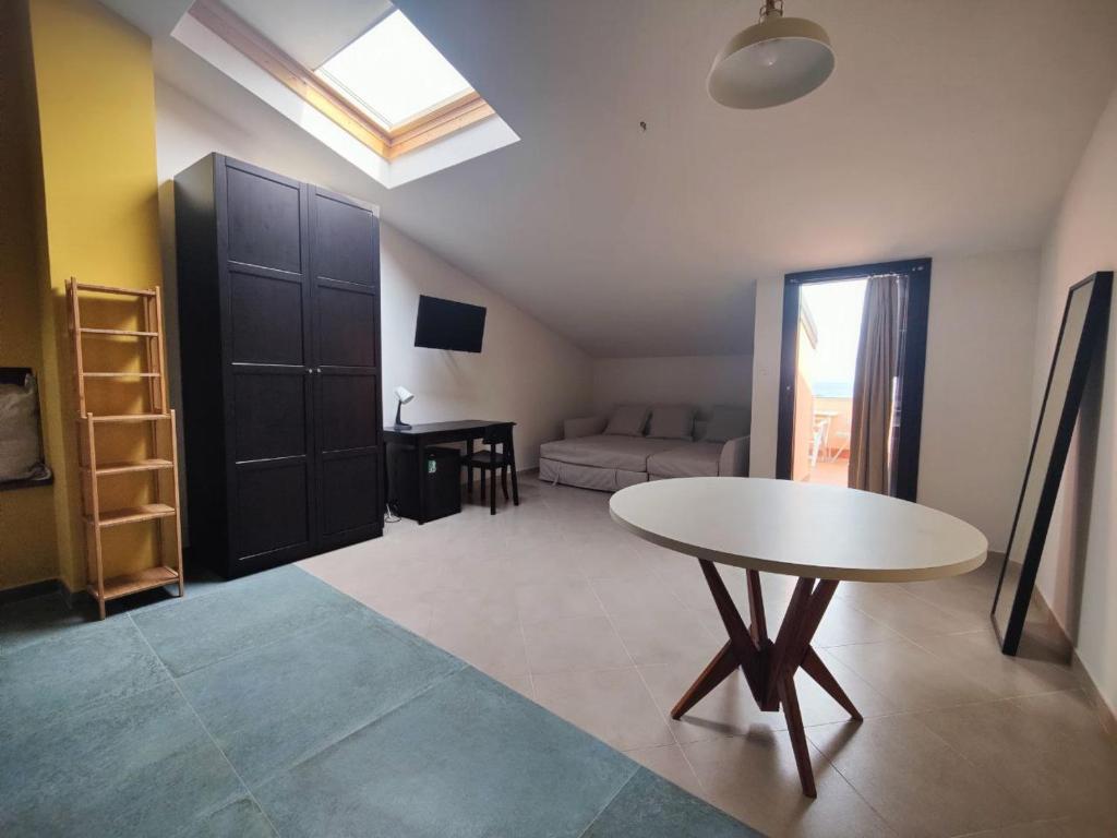 TV a/nebo společenská místnost v ubytování La Scivola Rooms