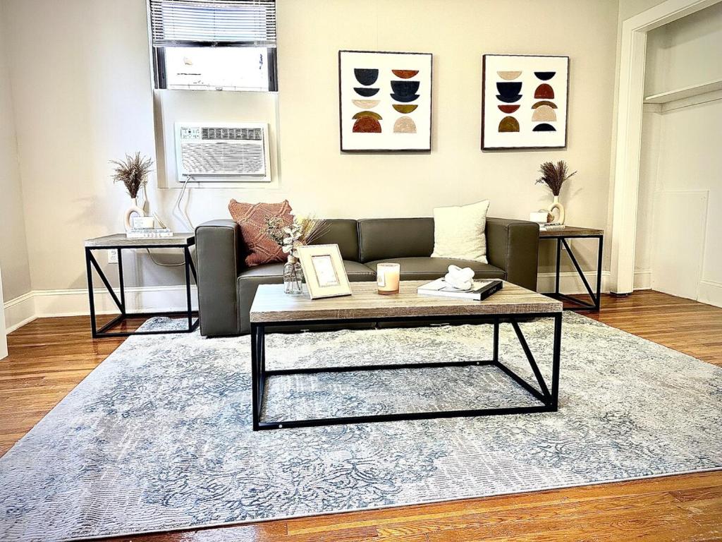 a living room with a couch and a coffee table at Peaceful & Perfect Private 1-br I Lennox in Philadelphia