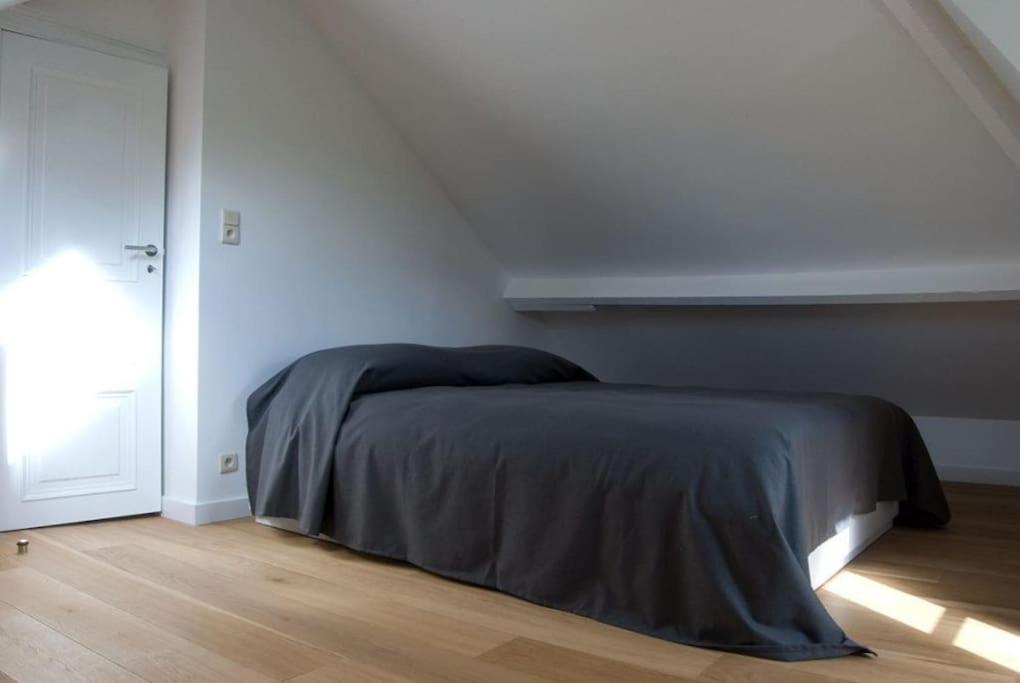 Postel nebo postele na pokoji v ubytování Le Chaperon Villa