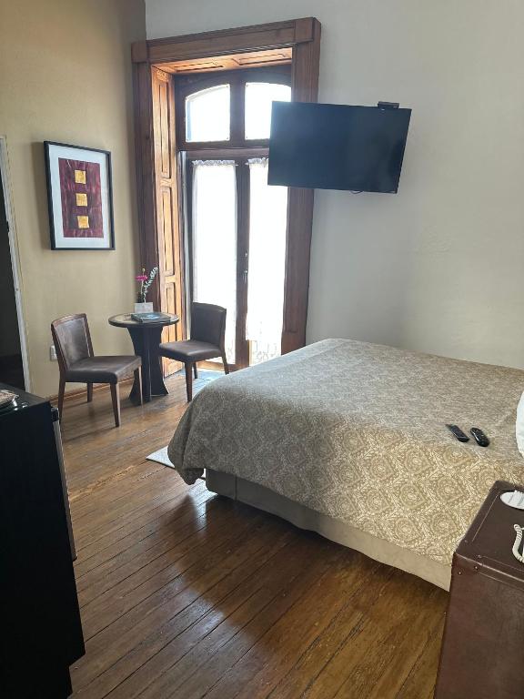 Postel nebo postele na pokoji v ubytování Casa Aspeytia Hotel Boutique