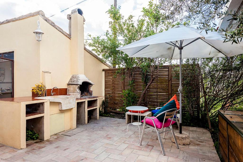 Patio nebo venkovní prostory v ubytování Villa Carmen