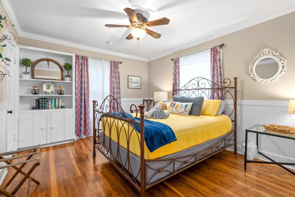 a bedroom with a bed and a ceiling fan at Madison Terrace - Large Home With Game Room - 10 in Clarksville