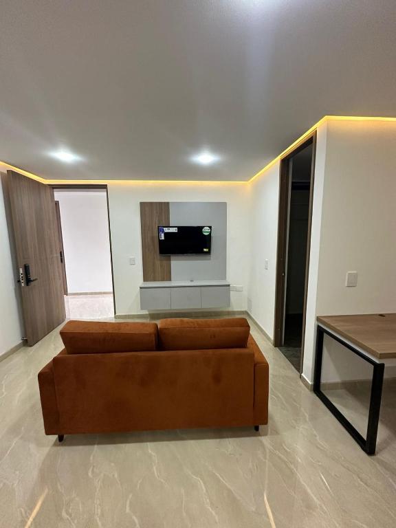 Televiisor ja/või meelelahutuskeskus majutusasutuses Mar Apartamentos