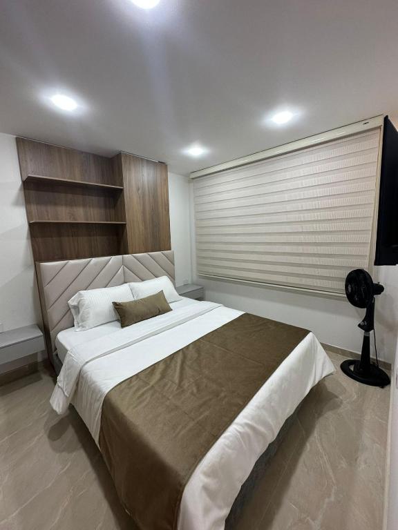 Voodi või voodid majutusasutuse Mar Apartamentos toas