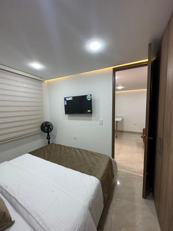 Voodi või voodid majutusasutuse Mar Apartamentos toas