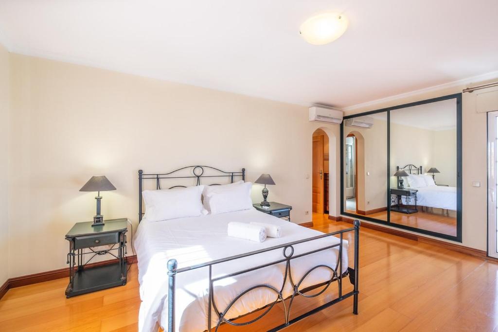 Postel nebo postele na pokoji v ubytování Casa Vela Palace