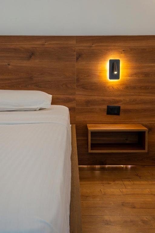 Postel nebo postele na pokoji v ubytování North Alpine Villas