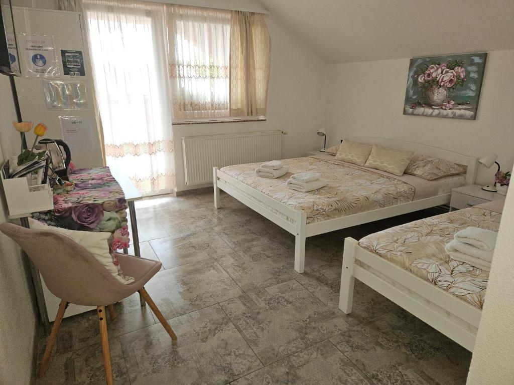 Postel nebo postele na pokoji v ubytování Rooms Sapina