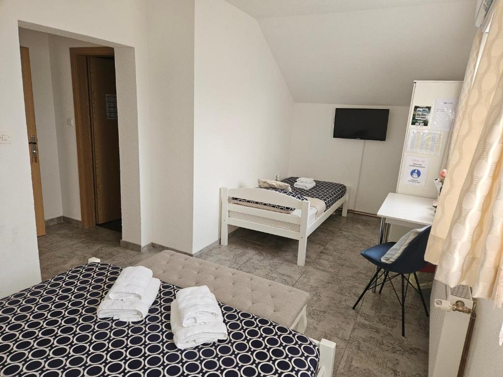 Postel nebo postele na pokoji v ubytování Rooms Sapina