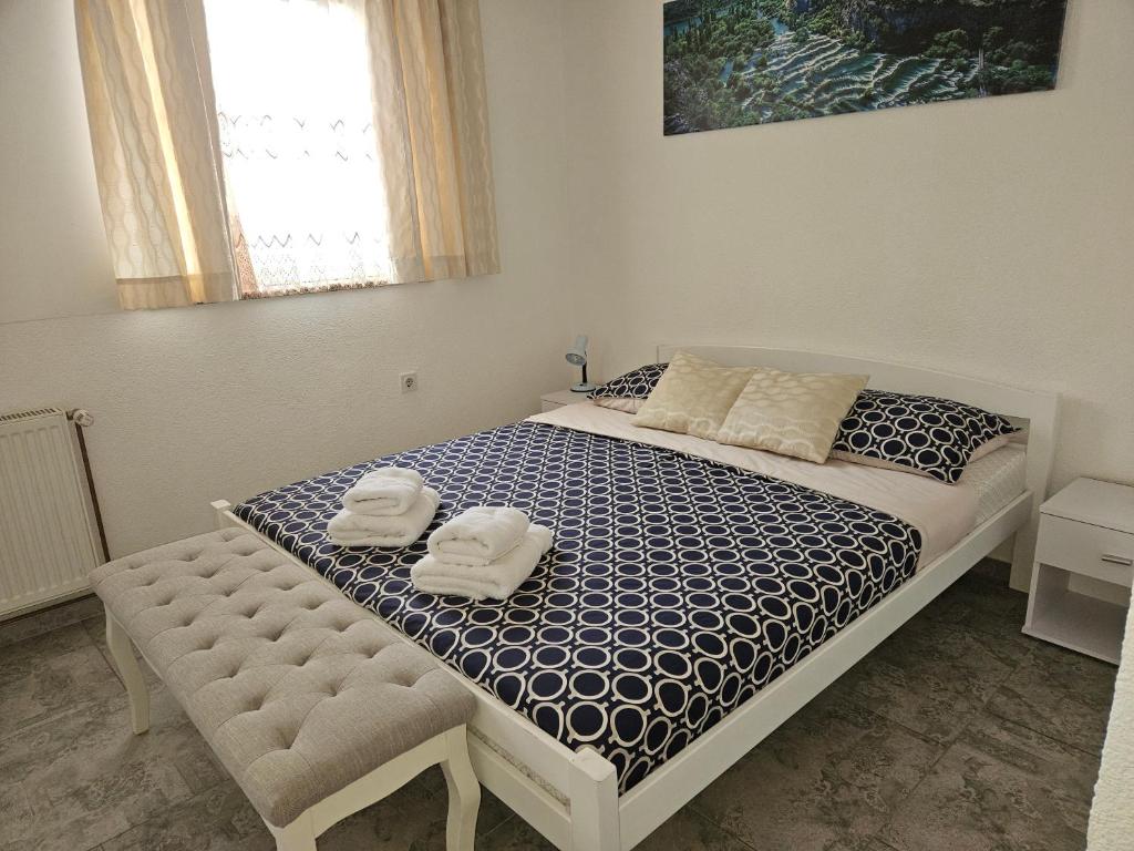 Postel nebo postele na pokoji v ubytování Rooms Sapina