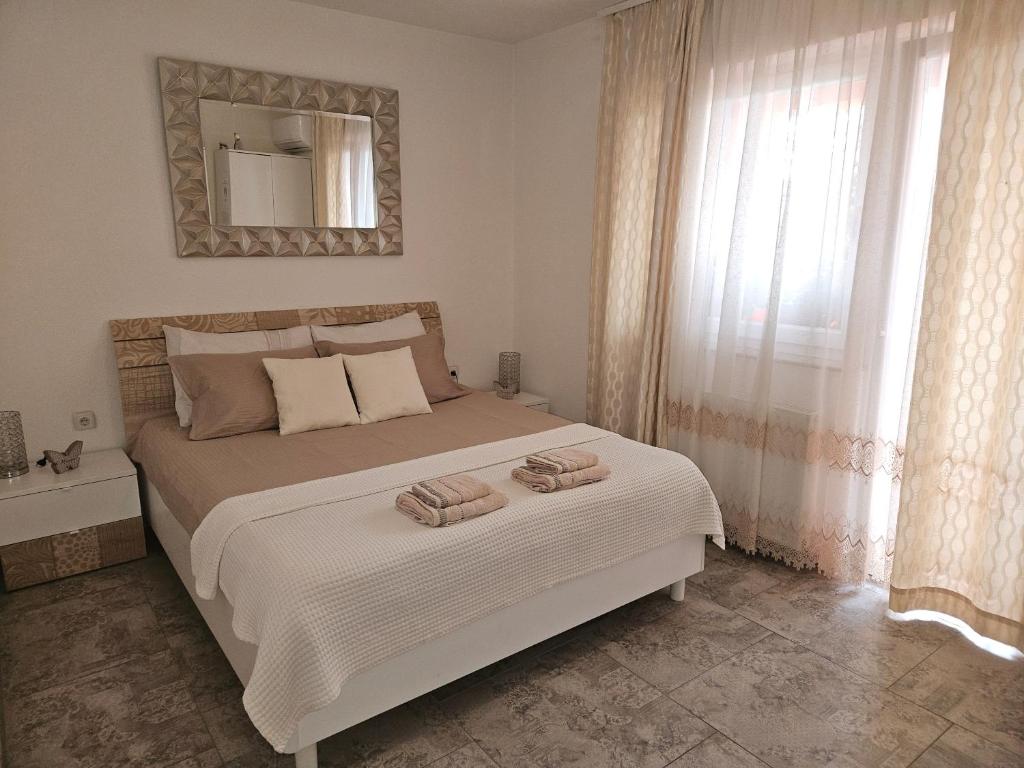 Postel nebo postele na pokoji v ubytování Rooms Sapina