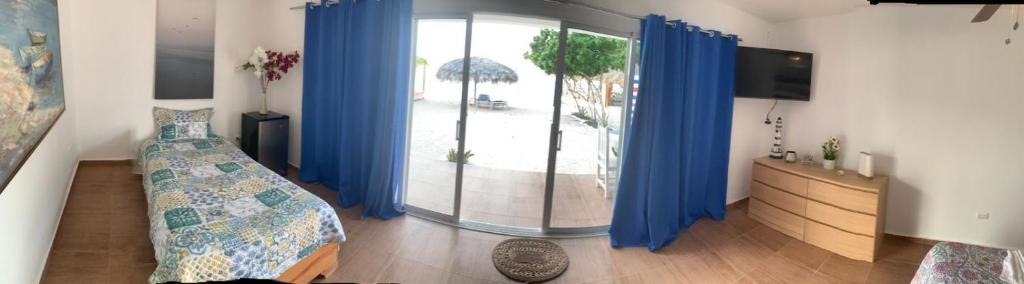 Postel nebo postele na pokoji v ubytování La Isla Bonita