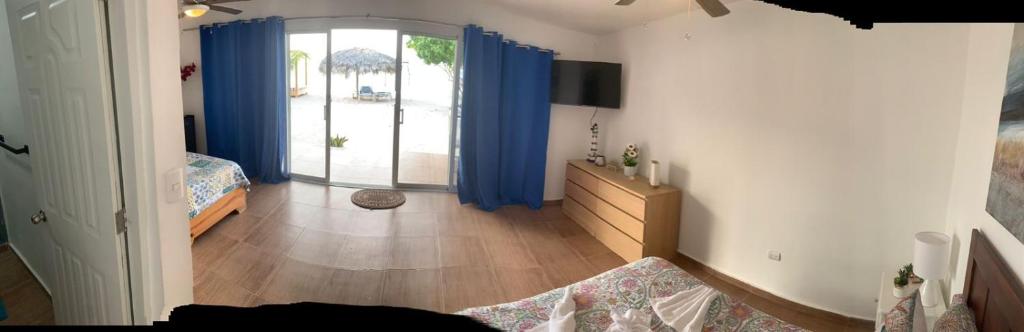Postel nebo postele na pokoji v ubytování La Isla Bonita