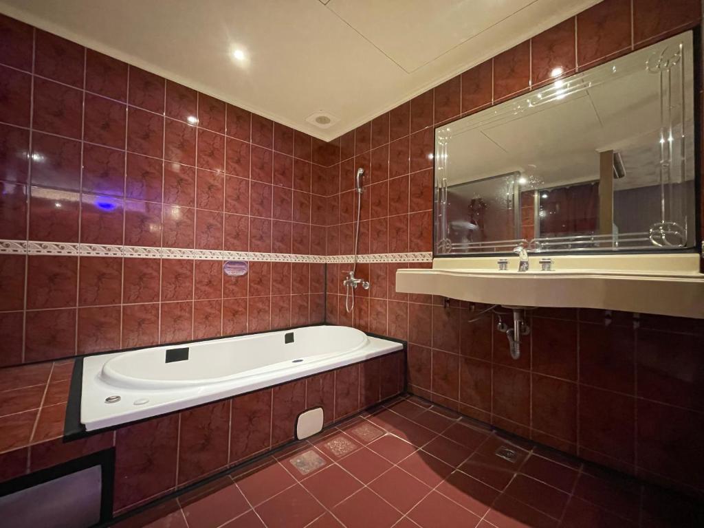 Koupelna v ubytování King & Princess Motel - Rende