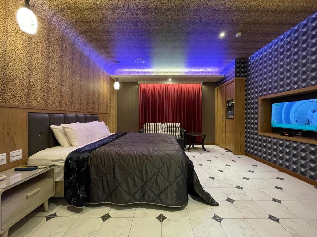 Postel nebo postele na pokoji v ubytování King & Princess Motel - Rende