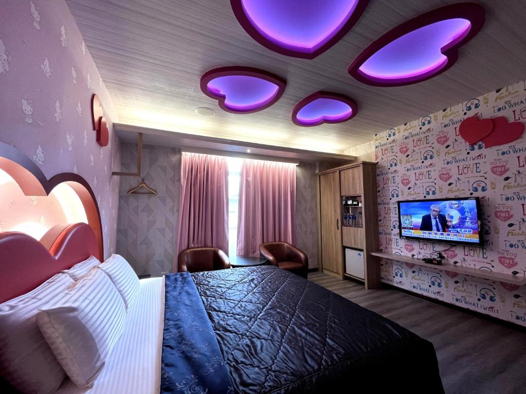 Postel nebo postele na pokoji v ubytování King & Princess Motel - Rende