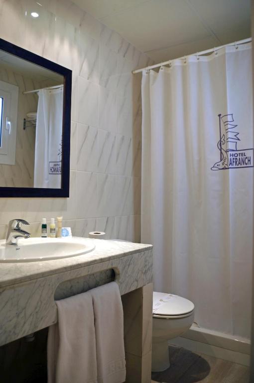 Koupelna v ubytování Hotel Llafranch