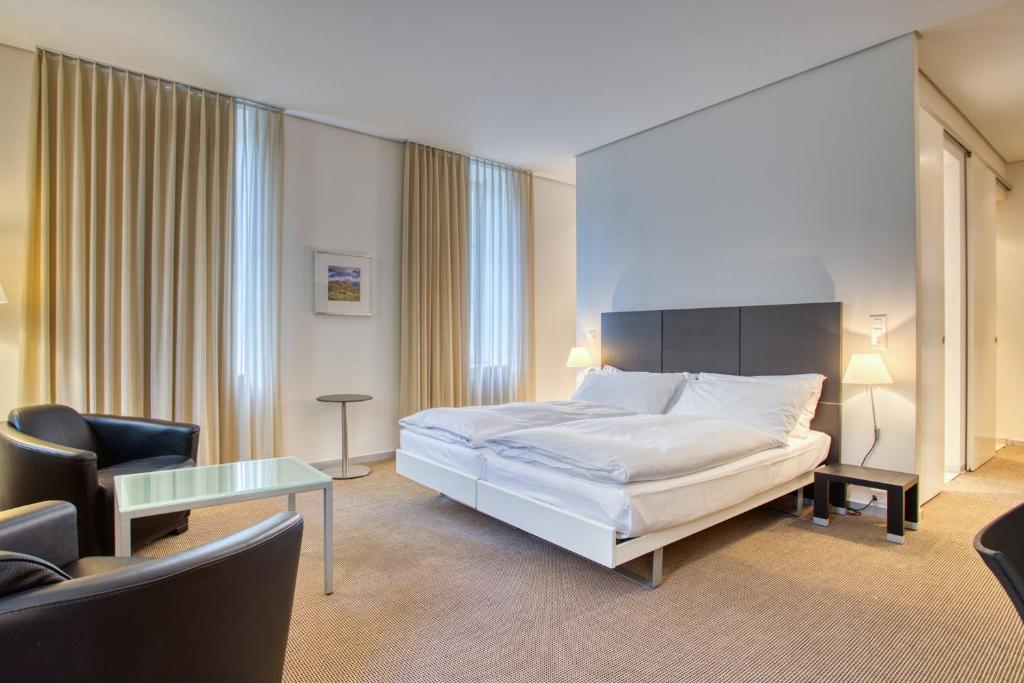 Postel nebo postele na pokoji v ubytování Hôtel Au Terminus