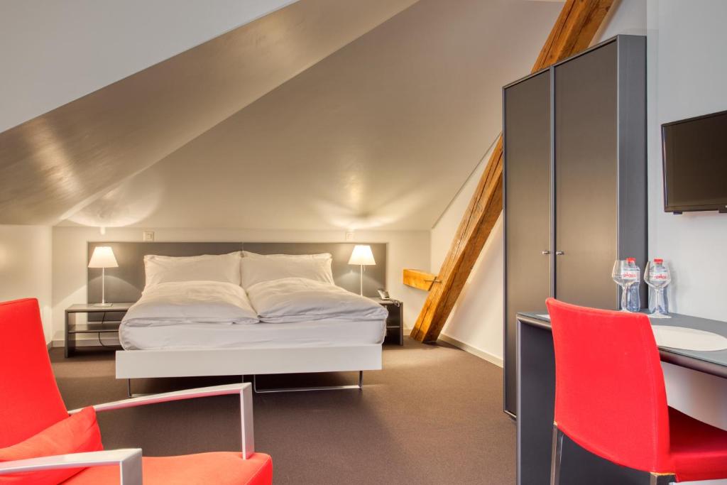 Postel nebo postele na pokoji v ubytování Hôtel Au Terminus