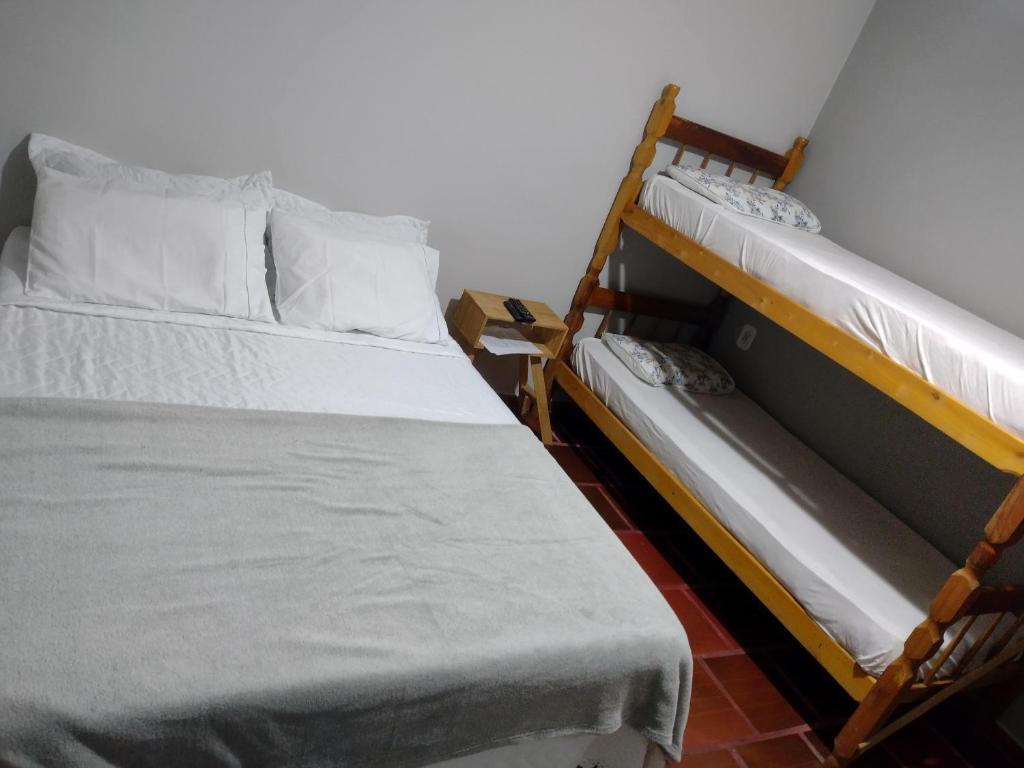 Postel nebo postele na pokoji v ubytování Pousada Cantinho D´Lilica