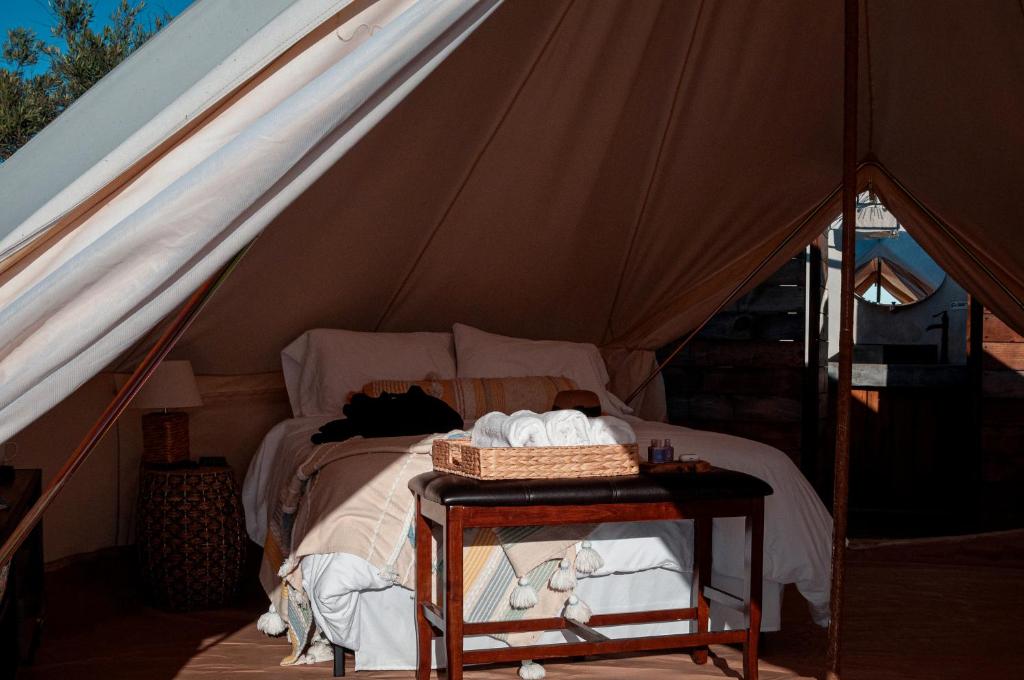 Postel nebo postele na pokoji v ubytování Glamping Valle de Guadalupe with Private Bathrooms by YUMA Resort