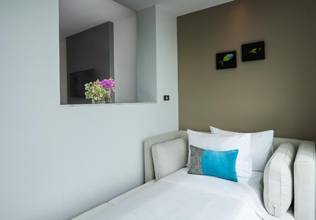 Postel nebo postele na pokoji v ubytování Loligo Resort Hua Hin