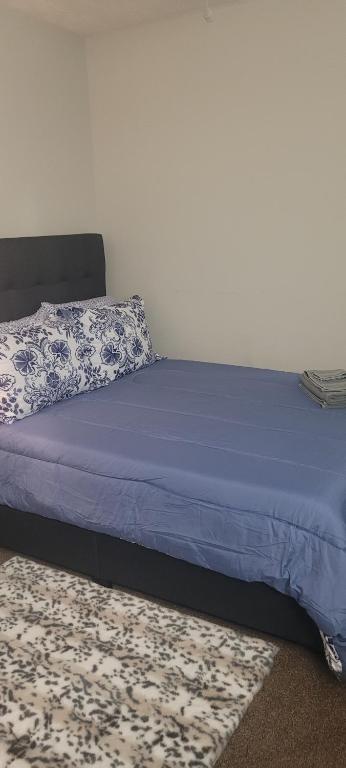 Postel nebo postele na pokoji v ubytování Central Pointe Pad
