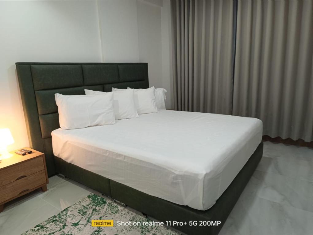 Postel nebo postele na pokoji v ubytování Hotel Sand View