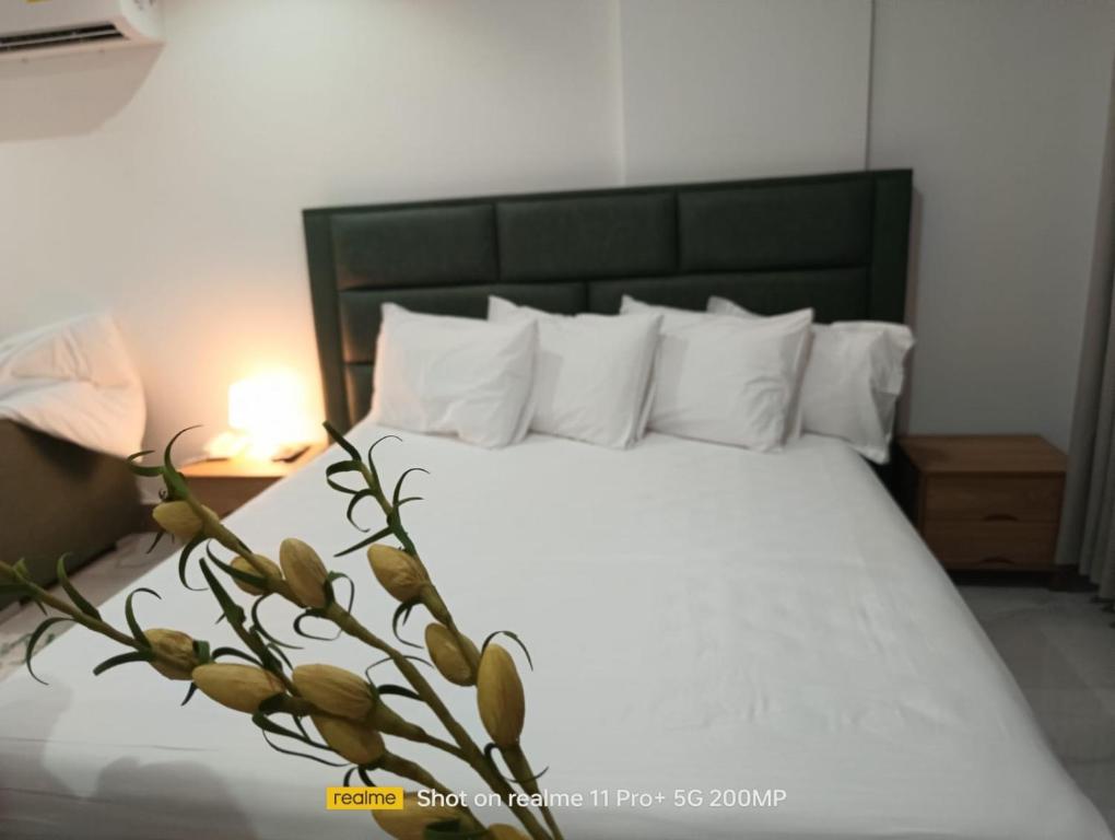 Postel nebo postele na pokoji v ubytování Hotel Sand View