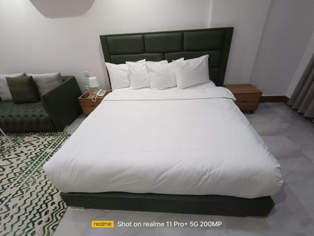 Postel nebo postele na pokoji v ubytování Hotel Sand View