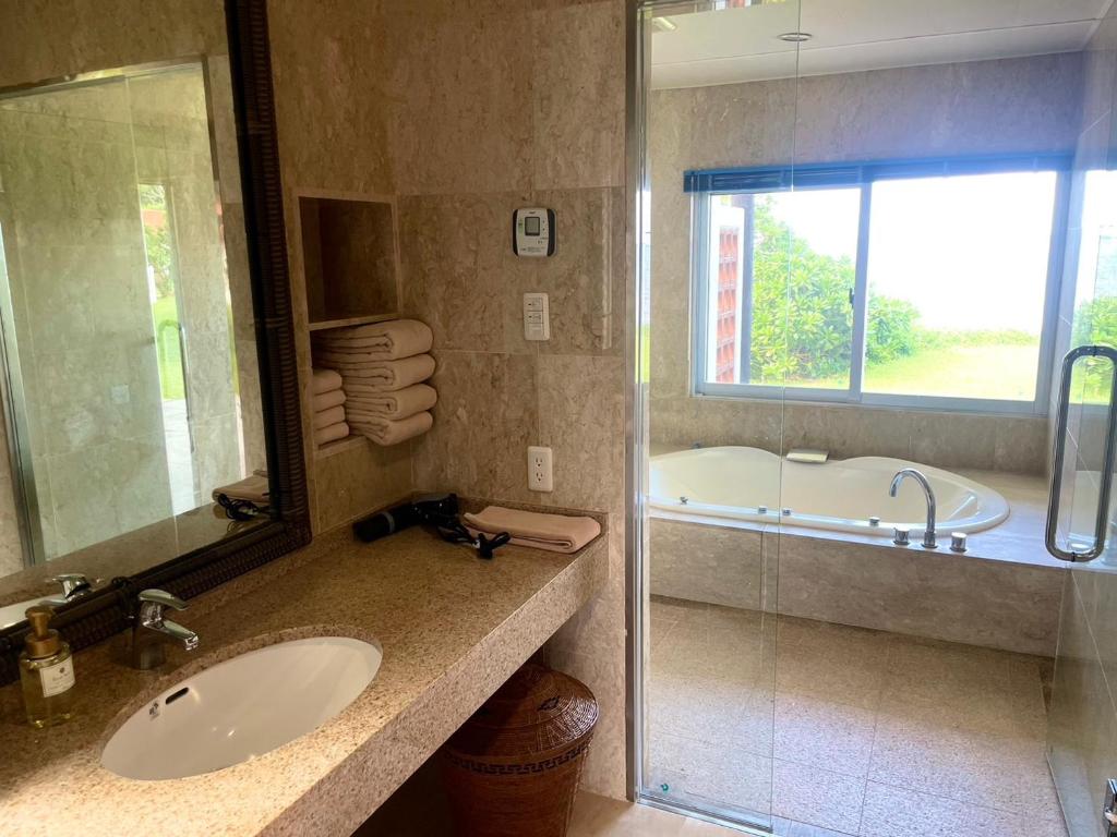 Koupelna v ubytování エコヴィレッジ西表 Eco Village Iriomote