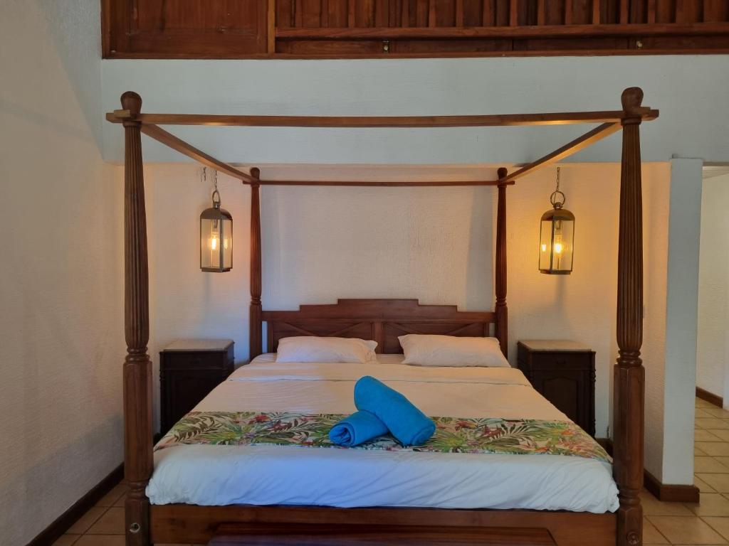 Кровать или кровати в номере Shanti Ghar Guest House