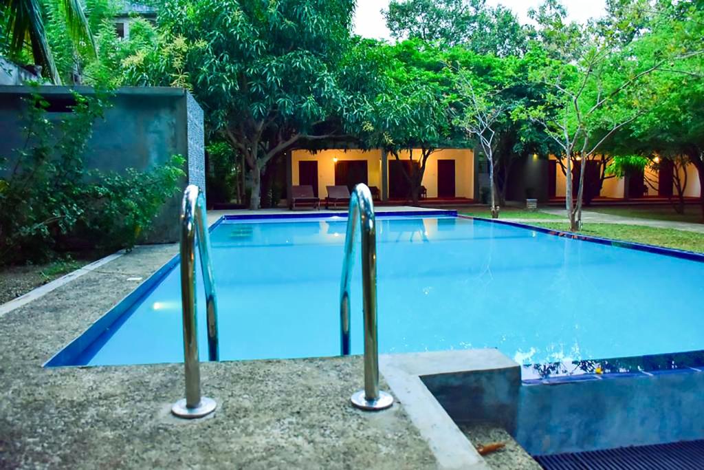 Bazén v ubytování Tropicara Resort nebo v jeho okolí