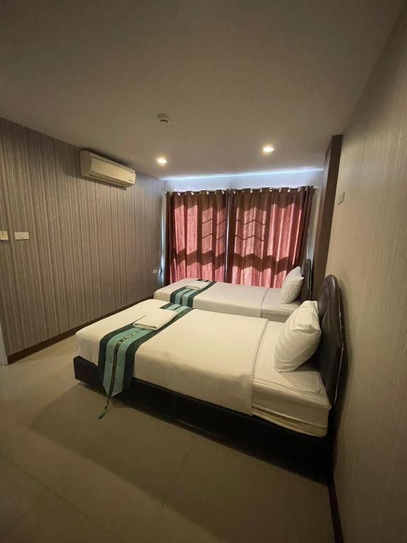 Postel nebo postele na pokoji v ubytování H2DO Hotel