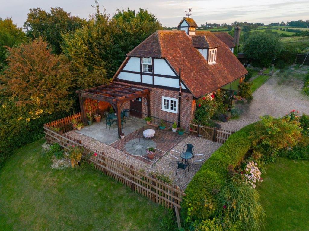 an aerial view of a house with a patio at Rose Cottage in Rye