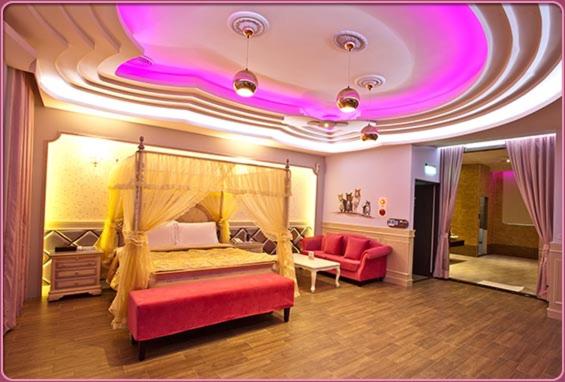Postel nebo postele na pokoji v ubytování Wei Feng Hotel - Kaohsiung