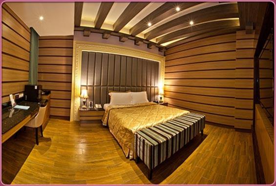 Postel nebo postele na pokoji v ubytování Wei Feng Hotel - Kaohsiung