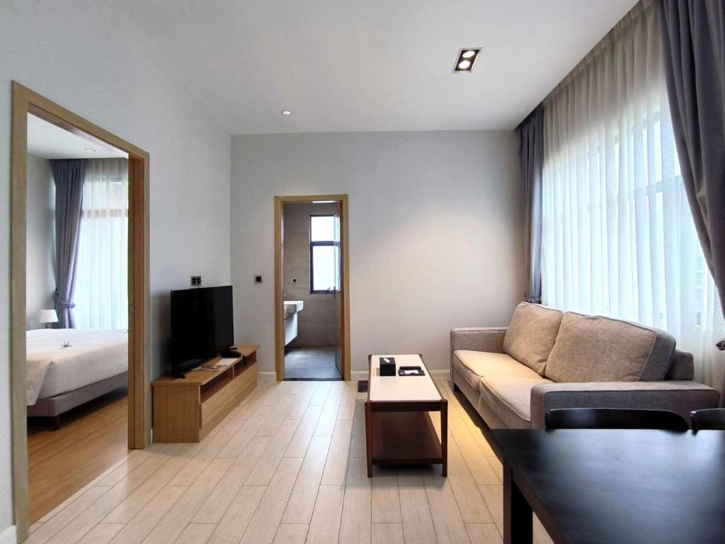 Postel nebo postele na pokoji v ubytování The View Serviced Residence 豪景日式酒店公寓