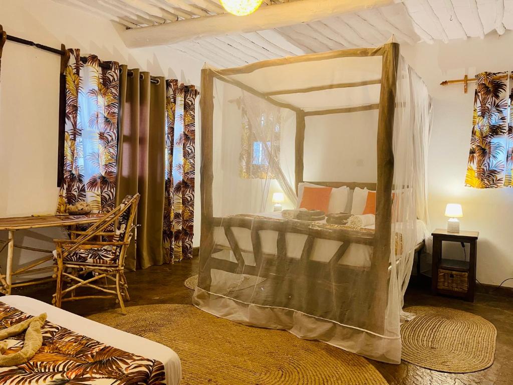 Postel nebo postele na pokoji v ubytování Casa Hera Diani