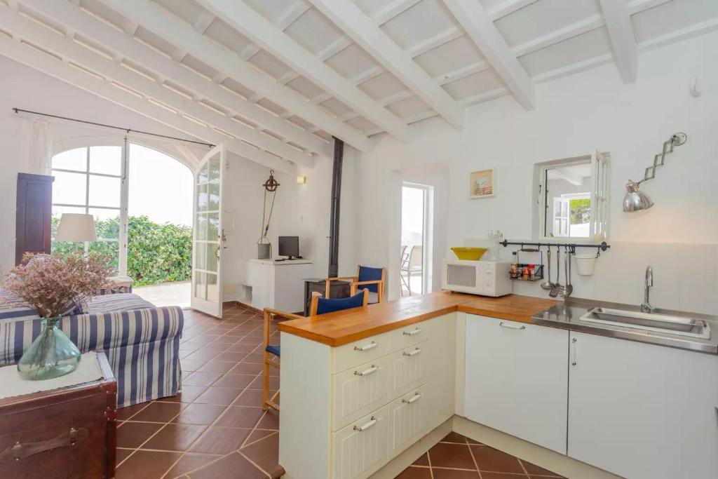 Kuchyň nebo kuchyňský kout v ubytování Menorca Agroturismo Llimpet